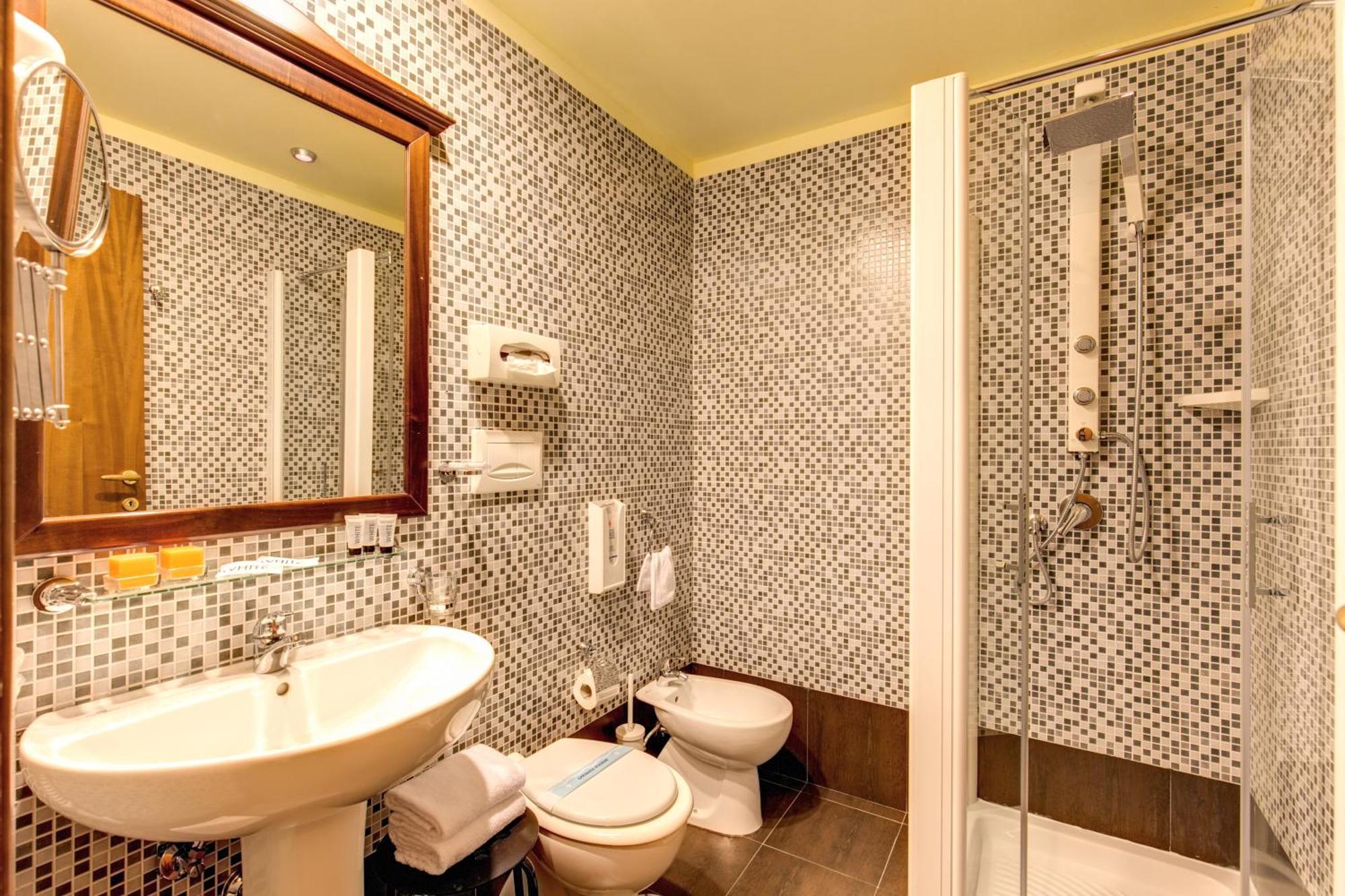 Hotel Tuscolana Róma Szoba fotó